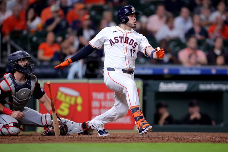 Apr 30, 2024; Houston, Texas, USA; Houston Astros catcher Victor Caratini (17) hits a walkoff home run against the Cleveland Guardians during the tenth inning at Minute Maid Park. Mandatory Credit: Erik Williams-USA TODAY Sports