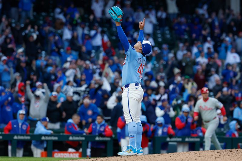 Apr 25, 2025; Chicago, Illinois, USA; Chicago Cubs relief pitcher Daniel Palencia (48) celebrates a win against the Philadelphia Phillies at Wrigley Field. Mandatory Credit: Kamil Krzaczynski-Imagn Images