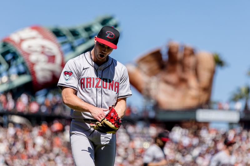 Apr 21, 2024; San Francisco, California, USA;  Arizona Diamondbacks pitcher Bryce Jarvis (40) reacts after ending the inning with the bases loaded during the seventh inning of the game against the San Francisco Giants at Oracle Park. Mandatory Credit: John Hefti-USA TODAY Sports