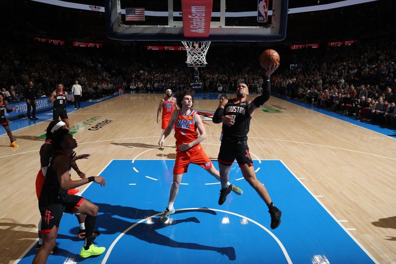 OKLAHOMA CITY, OK - MARCH 27:  Dillon Brooks #9 of the Houston Rockets drives to the basket during the game against the Oklahoma City Thunder on March 27, 2024 at Paycom Arena in Oklahoma City, Oklahoma. NOTE TO USER: User expressly acknowledges and agrees that, by downloading and or using this photograph, User is consenting to the terms and conditions of the Getty Images License Agreement. Mandatory Copyright Notice: Copyright 2024 NBAE (Photo by Zach Beeker/NBAE via Getty Images)