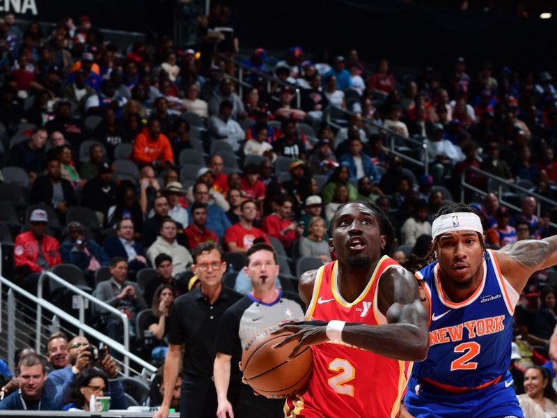 ATLANTA, GA - NOVEMBER 6: Keaton Wallace #2 of the Atlanta Hawks drives to the basket during the game against the New York Knicks during a regular season game on November 6, 2024 at State Farm Arena in Atlanta, Georgia.  NOTE TO USER: User expressly acknowledges and agrees that, by downloading and/or using this Photograph, user is consenting to the terms and conditions of the Getty Images License Agreement. Mandatory Copyright Notice: Copyright 2024 NBAE (Photo by Scott Cunningham/NBAE via Getty Images)