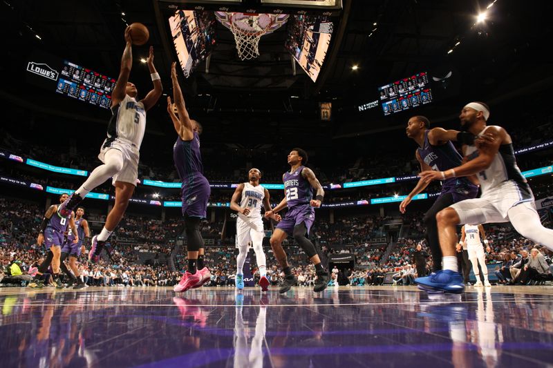 CHARLOTTE, NC - MARCH 5: Paolo Banchero #5 of the Orlando Magic shoots the ball during the game against the Charlotte Hornets on March 5, 2024 at Spectrum Center in Charlotte, North Carolina. NOTE TO USER: User expressly acknowledges and agrees that, by downloading and or using this photograph, User is consenting to the terms and conditions of the Getty Images License Agreement. Mandatory Copyright Notice: Copyright 2024 NBAE (Photo by Kent Smith/NBAE via Getty Images)