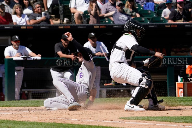 Jun 30, 2024; Chicago, Illinois, USA; Colorado Rockies outfielder Sam Hilliard (16) scores on Chicago White Sox catcher Korey Lee (26) during the tenth inning at Guaranteed Rate Field. Mandatory Credit: David Banks-USA TODAY Sports