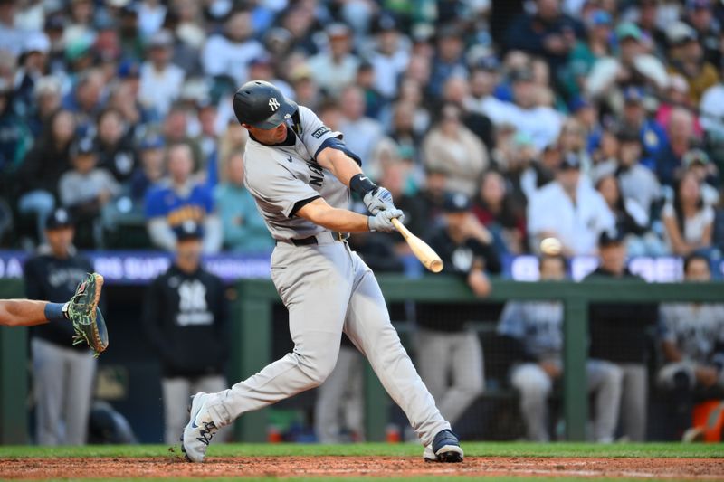 May 12, 2025; Seattle, Washington, USA; New York Yankees first baseman Paul Goldschmidt (48) hits a single against the Seattle Mariners during the fifth inning at T-Mobile Park. Mandatory Credit: Steven Bisig-Imagn Images