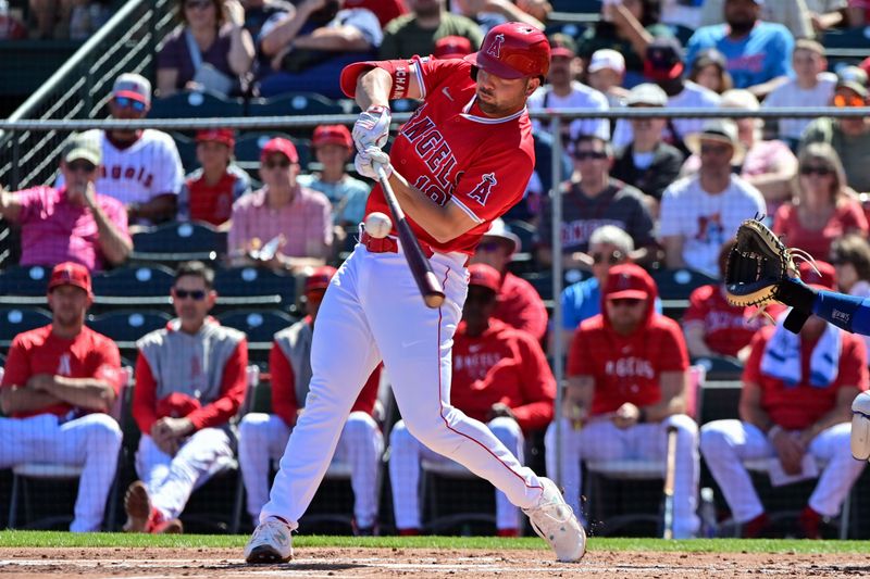 Mar 11, 2024; Tempe, Arizona, USA;  Los Angeles Angels first baseman Nolan Schanuel (18) grounds out in the first inning against the Texas Rangers during a spring training game at Tempe Diablo Stadium. Mandatory Credit: Matt Kartozian-USA TODAY Sports
