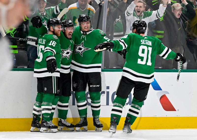 Dec 21, 2023; Dallas, Texas, USA; Dallas Stars center Matt Duchene (95) and defenseman Thomas Harley (55) and center Joe Pavelski (16) and center Tyler Seguin (91) celebrates after Duchene scores the game winning goal against the Vancouver Canucks during the overtime period at the American Airlines Center. Mandatory Credit: Jerome Miron-USA TODAY Sports