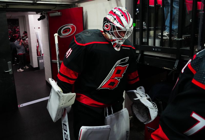 Jan 21, 2024; Raleigh, North Carolina, USA;  Carolina Hurricanes goalie Spencer Martin (41) comes out of the locker room for the warmups against the Minnesota Wild at PNC Arena. Mandatory Credit: James Guillory-USA TODAY Sports