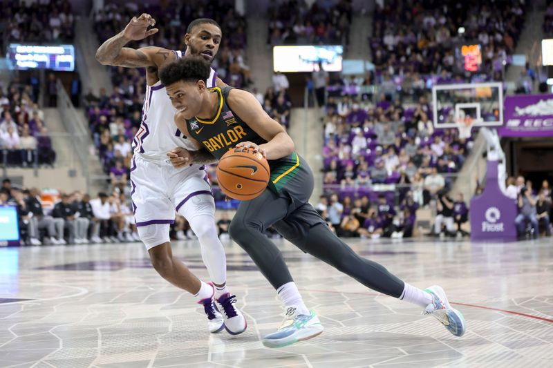 Feb 11, 2023; Fort Worth, Texas, USA;  Baylor Bears guard Keyonte George (1) drives to the basket as TCU Horned Frogs guard Rondel Walker (11) defends during the second half at Ed and Rae Schollmaier Arena. Mandatory Credit: Kevin Jairaj-USA TODAY Sports