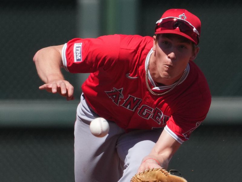 Mar 13, 2024; Surprise, Arizona, USA; Los Angeles Angels third baseman Cole Fontenelle (76) catches a line drive against the Kansas City Royals during the second inning at Surprise Stadium. Mandatory Credit: Joe Camporeale-USA TODAY Sports