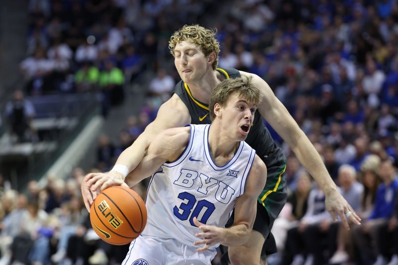 Feb 20, 2024; Provo, Utah, USA; Baylor Bears forward Caleb Lohner (rear) knocks the ball away from Brigham Young Cougars guard Dallin Hall (30) during the second half at Marriott Center. Mandatory Credit: Rob Gray-USA TODAY Sports