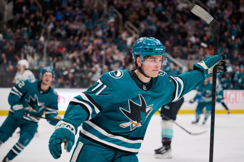 Nov 29, 2024; San Jose, California, USA; San Jose Sharks center Macklin Celebrini (71) reacts after scoring a goal against the Seattle Kraken during the second period at SAP Center at San Jose. Mandatory Credit: Robert Edwards-Imagn Images