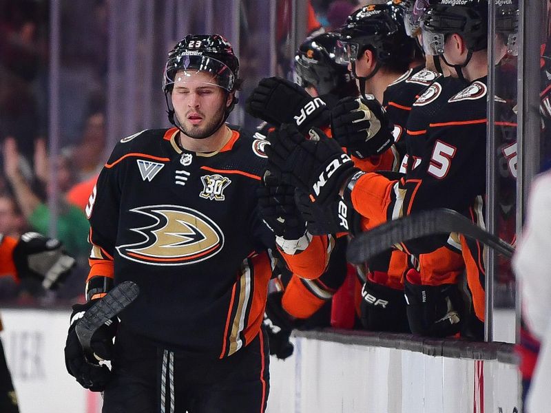 Feb 21, 2024; Anaheim, California, USA; Anaheim Ducks center Mason McTavish (23) celebrates his goal scored agianst the Columbus Blue Jackets during the second period at Honda Center. Mandatory Credit: Gary A. Vasquez-USA TODAY Sports