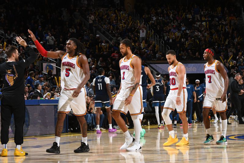 SAN FRANCISCO, CA - DECEMBER 8: Kevon Looney #5, Kyle Anderson #1, Stephen Curry #30 and Buddy Hield #7 of the Golden State Warriors during the game against the Minnesota Timberwolves  during a regular season game on December 8, 2024 at Chase Center in San Francisco, California. NOTE TO USER: User expressly acknowledges and agrees that, by downloading and or using this photograph, user is consenting to the terms and conditions of Getty Images License Agreement. Mandatory Copyright Notice: Copyright 2024 NBAE (Photo by Noah Graham/NBAE via Getty Images)