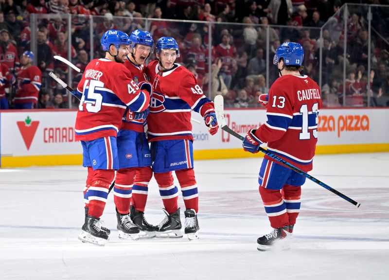 Dec 18, 2025; Montreal, Quebec, CAN; Montreal Canadiens forward Zack Bolduc (76) celebrates with teammates including forward Cole Caufield (13) after scoring a goal against the Chicago Blackhawks during the first period at the Bell Centre. Mandatory Credit: Eric Bolte-Imagn Images