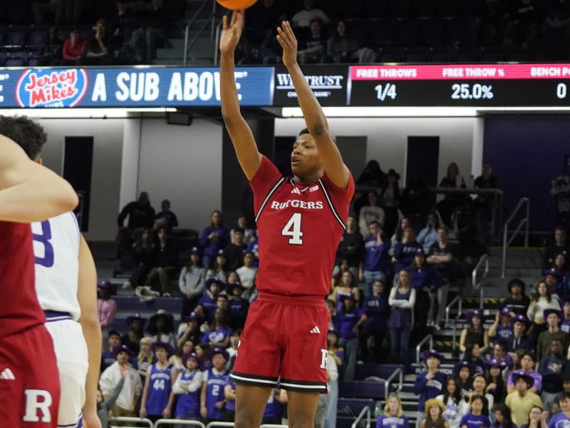 Jan 29, 2025; Evanston, Illinois, USA; Rutgers Scarlet Knights guard Ace Bailey (4) makes a three point basket against the Northwestern Wildcats during the first half at Welsh-Ryan Arena. Mandatory Credit: David Banks-Imagn Images