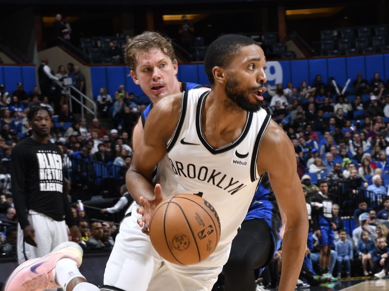 ORLANDO, FL - FEBRUARY 27: Mikal Bridges #1 of the Brooklyn Nets drives to the basket during the game against the Orlando Magic on February 27, 2024 at the Kia Center in Orlando, Florida. NOTE TO USER: User expressly acknowledges and agrees that, by downloading and or using this photograph, User is consenting to the terms and conditions of the Getty Images License Agreement. Mandatory Copyright Notice: Copyright 2024 NBAE (Photo by Gary Bassing/NBAE via Getty Images)