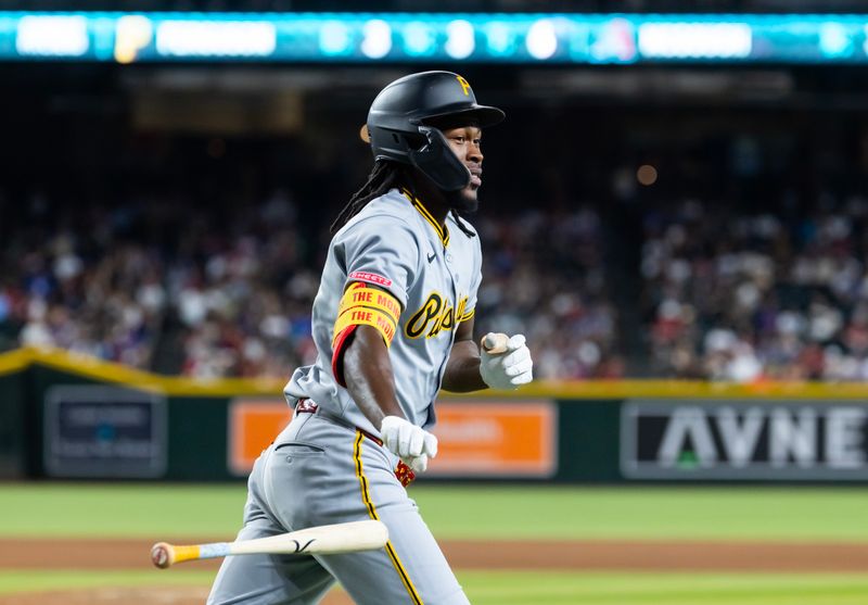 May 28, 2025; Phoenix, Arizona, USA; Pittsburgh Pirates outfielder Oneil Cruz rounds the bases after hitting a two run home run in the eighth inning against the Arizona Diamondbacks at Chase Field. Mandatory Credit: Mark J. Rebilas-Imagn Images