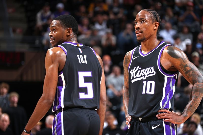 SALT LAKE CITY, UT - OCTOBER 15: DeMar DeRozan #10 and De'Aaron Fox #5 of the Sacramento Kings look on during the game against the Utah Jazz on October 15, 2024 at Delta Center in Salt Lake City, Utah. NOTE TO USER: User expressly acknowledges and agrees that, by downloading and or using this Photograph, User is consenting to the terms and conditions of the Getty Images License Agreement. Mandatory Copyright Notice: Copyright 2024 NBAE (Photo by Melissa Majchrzak/NBAE via Getty Images)