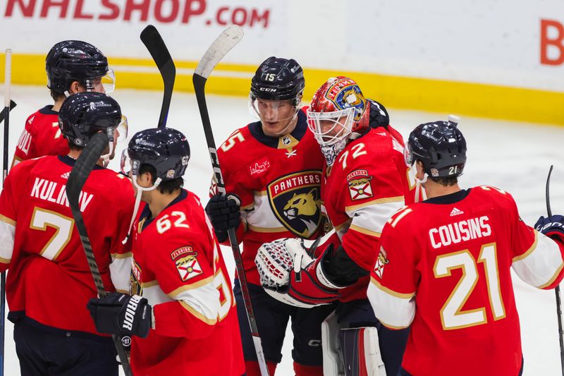 Dec 8, 2023; Sunrise, Florida, USA; Florida Panthers goaltender Sergei Bobrovsky (72) celebrates with teammates after winning the game against the Pittsburgh Penguins at Amerant Bank Arena. Mandatory Credit: Sam Navarro-USA TODAY Sports