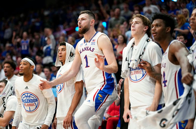  Nov 6, 2023; Lawrence, Kansas, USA; The Kansas Jayhawks starters react on the bench during the second half against the North Carolina Central Eagles at Allen Fieldhouse. Mandatory Credit: Jay Biggerstaff-USA TODAY Sports