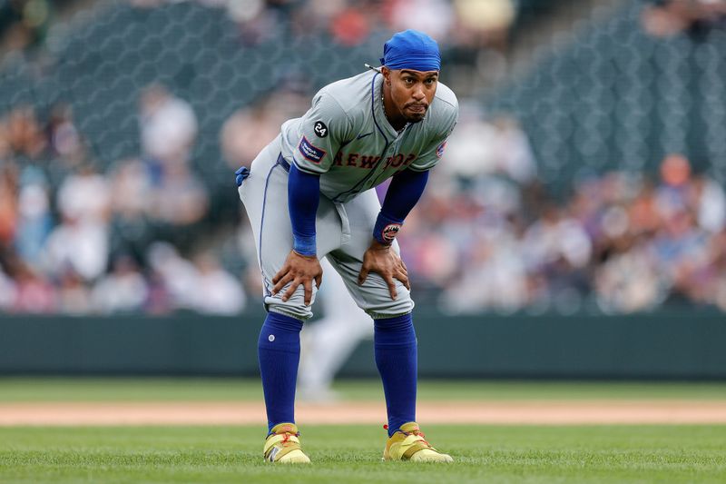 Aug 8, 2024; Denver, Colorado, USA; New York Mets shortstop Francisco Lindor (12) in the middle of the eighth inning against the Colorado Rockies at Coors Field. Mandatory Credit: Isaiah J. Downing-USA TODAY Sports