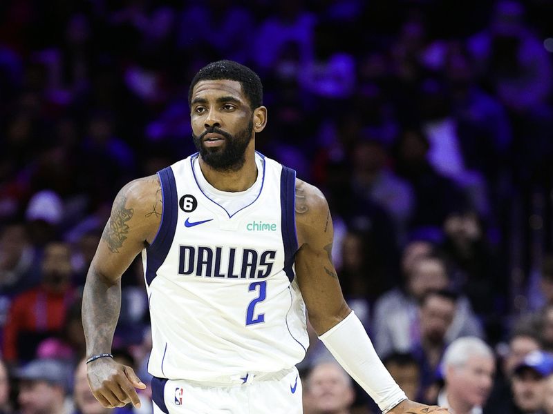 PHILADELPHIA, PENNSYLVANIA - MARCH 29: Kyrie Irving #2 of the Dallas Mavericks dribbles during the third quarter against the Philadelphia 76ers at Wells Fargo Center on March 29, 2023 in Philadelphia, Pennsylvania. NOTE TO USER: User expressly acknowledges and agrees that, by downloading and or using this photograph, User is consenting to the terms and conditions of the Getty Images License Agreement. (Photo by Tim Nwachukwu/Getty Images)