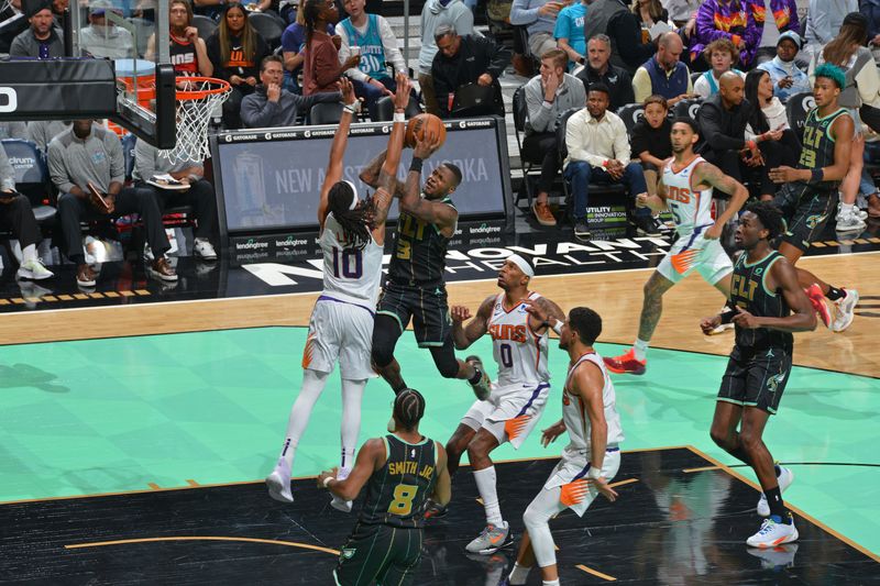 CHARLOTTE, NC - MARCH 1: Terry Rozier #3 of the Charlotte Hornets drives to the basket against the Phoenix Suns on March 1, 2023 at Spectrum Center in Charlotte, North Carolina. NOTE TO USER: User expressly acknowledges and agrees that, by downloading and or using this photograph, User is consenting to the terms and conditions of the Getty Images License Agreement. Mandatory Copyright Notice: Copyright 2023 NBAE (Photo by Jesse D. Garrabrant/NBAE via Getty Images)