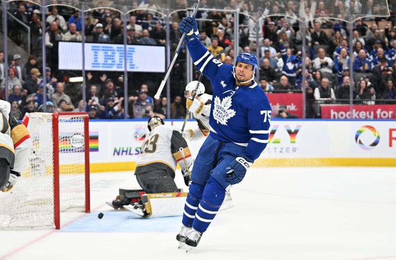 Feb 27, 2024; Toronto, Ontario, CAN;   Toronto Maple Leafs forward Ryan Reaves (75) celebrates after scoring a goal past Vegas Golden Knights goalie Adin Hill (33) in the third period at Scotiabank Arena. Mandatory Credit: Dan Hamilton-USA TODAY Sports