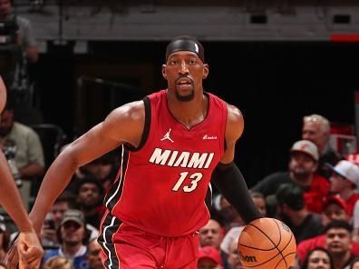 MIAMI, FL - DECEMBER 25:  Bam Adebayo #13 of the Miami Heat handles the ball during the game  on December 25, 2023 at Kaseya Center Arena in Miami, Florida. NOTE TO USER: User expressly acknowledges and agrees that, by downloading and or using this Photograph, user is consenting to the terms and conditions of the Getty Images License Agreement. Mandatory Copyright Notice: Copyright 2023 NBAE (Photo by Issac Baldizon/NBAE via Getty Images)