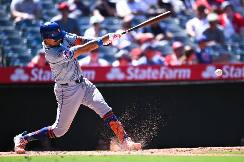 Aug 4, 2024; Anaheim, California, USA; New York Mets third baseman Mark Vientos (27) is forced out at first base against the Los Angeles Angels during the sixth inning at Angel Stadium. Mandatory Credit: Jonathan Hui-USA TODAY Sports