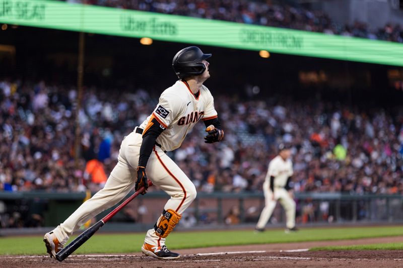 Jun 10, 2024; San Francisco, California, USA; San Francisco Giants right fielder Mike Yastrzemski (5) hits an RBI triple against the Houston Astros during the sixth inning at Oracle Park. Mandatory Credit: John Hefti-USA TODAY Sports