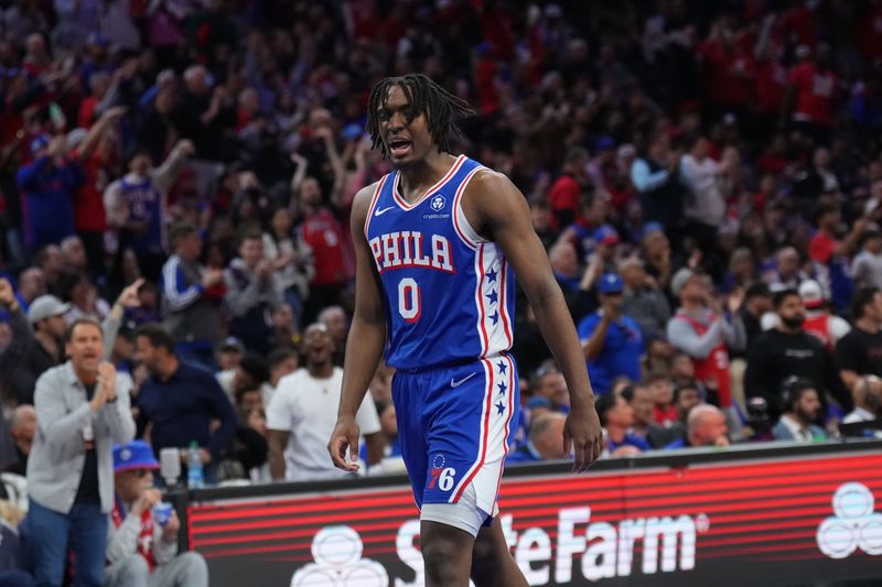 PHILADELPHIA, PA - APRIL 25: Tyrese Maxey #0 of the Philadelphia 76ers celebrates during the game against the New York Knicks during Round 1 Game 3 of the 2024 NBA Playoffs on April 25, 2024 at the Wells Fargo Center in Philadelphia, Pennsylvania NOTE TO USER: User expressly acknowledges and agrees that, by downloading and/or using this Photograph, user is consenting to the terms and conditions of the Getty Images License Agreement. Mandatory Copyright Notice: Copyright 2024 NBAE (Photo by Jesse D. Garrabrant/NBAE via Getty Images)