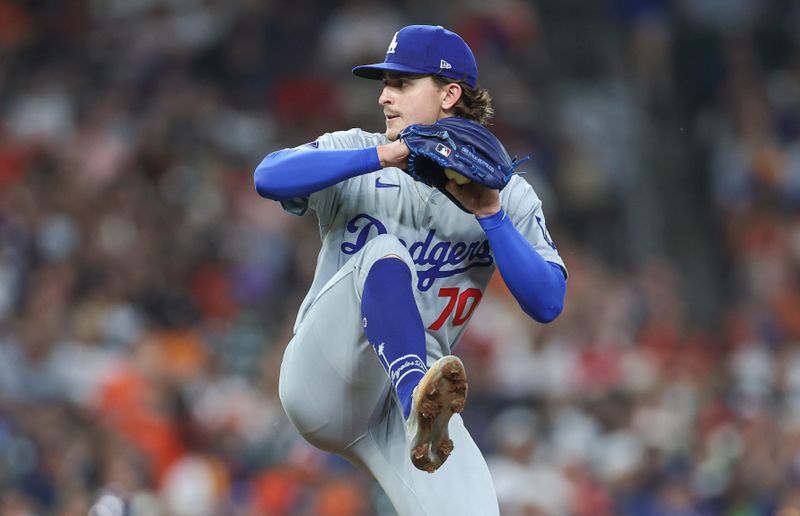 Jul 27, 2024; Houston, Texas, USA; Los Angeles Dodgers starting pitcher Justin Wrobleski (70) delivers a pitch during the sixth inning against the Houston Astros at Minute Maid Park. Mandatory Credit: Troy Taormina-USA TODAY Sports