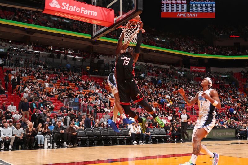 MIAMI, FL - FEBRUARY 6: Bam Adebayo #13 of the Miami Heat dunks the ball during the game against the Orlando Magic on February 6, 2024 at Kaseya Center in Miami, Florida. NOTE TO USER: User expressly acknowledges and agrees that, by downloading and or using this Photograph, user is consenting to the terms and conditions of the Getty Images License Agreement. Mandatory Copyright Notice: Copyright 2024 NBAE (Photo by Issac Baldizon/NBAE via Getty Images)