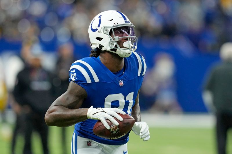 Indianapolis Colts tight end Mo Alie-Cox (81) warms up before an NFL football game against the Pittsburgh Steelers Sunday, Sept. 29, 2024, in Indianapolis. (AP Photo/Darron Cummings)