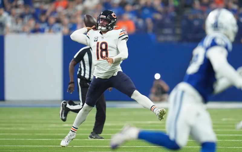 Chicago Bears quarterback Caleb Williams (18) throws against the Indianapolis Colts during the first half of an NFL football game Sunday, Sept. 22, 2024, in Indianapolis. (AP Photo/Michael Conroy)