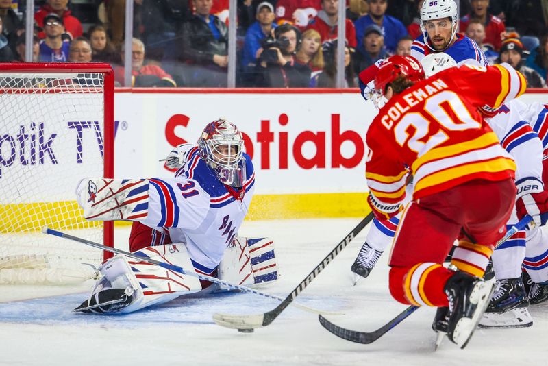 Oct 24, 2023; Calgary, Alberta, CAN; New York Rangers goaltender Igor Shesterkin (31) makes a save against Calgary Flames center Blake Coleman (20) during the second period at Scotiabank Saddledome. Mandatory Credit: Sergei Belski-USA TODAY Sports