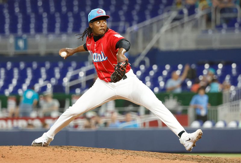 Jun 3, 2023; Miami, Florida, USA; Miami Marlins relief pitcher George Soriano (62) pitches against the Oakland Athletics during the ninth inning at loanDepot Park. Mandatory Credit: Rhona Wise-USA TODAY Sports