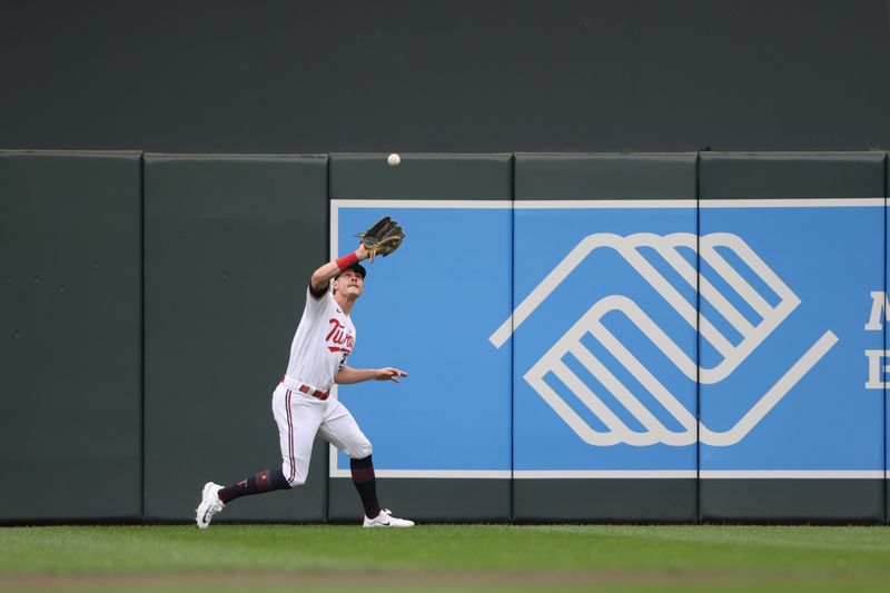 Oct 4, 2023; Minneapolis, Minnesota, USA; Minnesota Twins right fielder Max Kepler (26) catches a fly ball in the first inning against the Toronto Blue Jays during game two of the Wildcard series for the 2023 MLB playoffs at Target Field. Mandatory Credit: Jesse Johnson-USA TODAY Sports