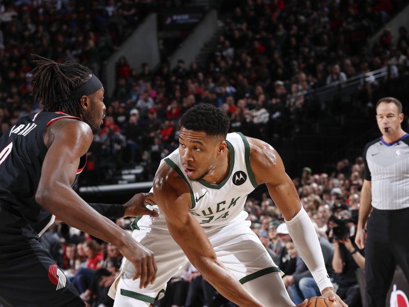 PORTLAND, OR - JANUARY 31:  Giannis Antetokounmpo #34 of the Milwaukee Bucks handles the ball during the game  on January 31, 2024 at the Moda Center Arena in Portland, Oregon. NOTE TO USER: User expressly acknowledges and agrees that, by downloading and or using this photograph, user is consenting to the terms and conditions of the Getty Images License Agreement. Mandatory Copyright Notice: Copyright 2024 NBAE (Photo by Cameron Browne/NBAE via Getty Images)