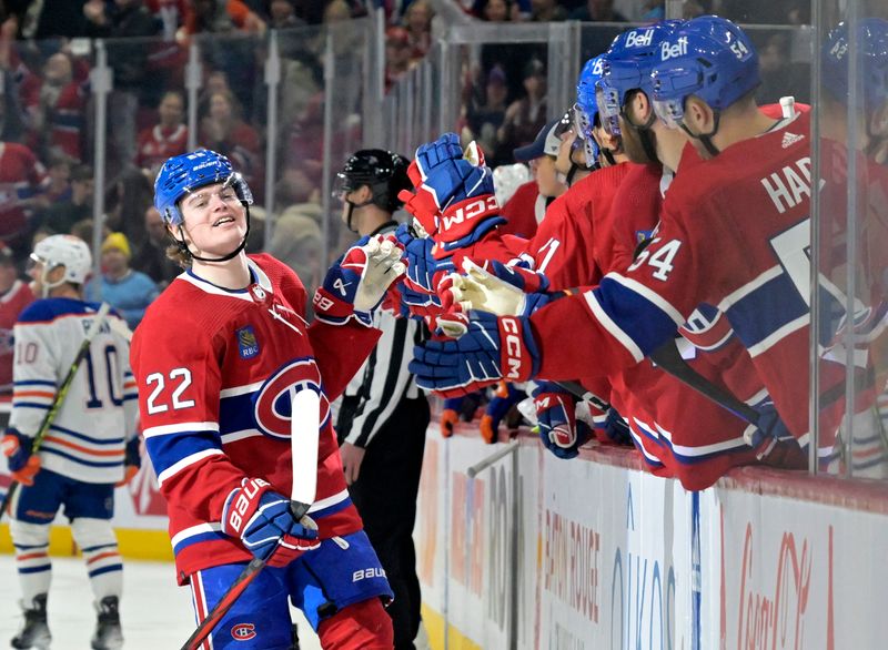 Jan 13, 2024; Montreal, Quebec, CAN; Montreal Canadiens forward Cole Caufield (22) celebrates with teammates after scoring a goal against the Edmonton Oilers during the first period at the Bell Centre. Mandatory Credit: Eric Bolte-USA TODAY Sports