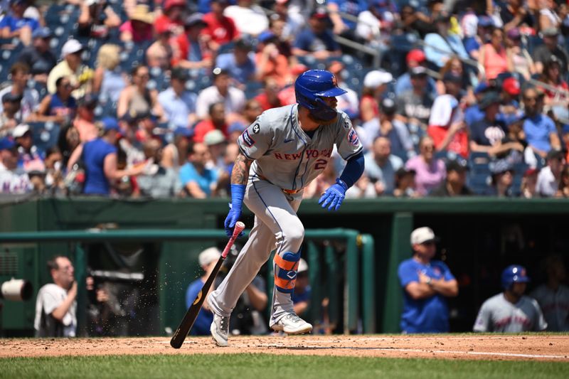 Jul 4, 2024; Washington, District of Columbia, USA; New York Mets left fielder Ben Gamel (21) reacts on his way to first base against the Washington Nationals during the fifth inning at Nationals Park. Mandatory Credit: Rafael Suanes-USA TODAY Sports