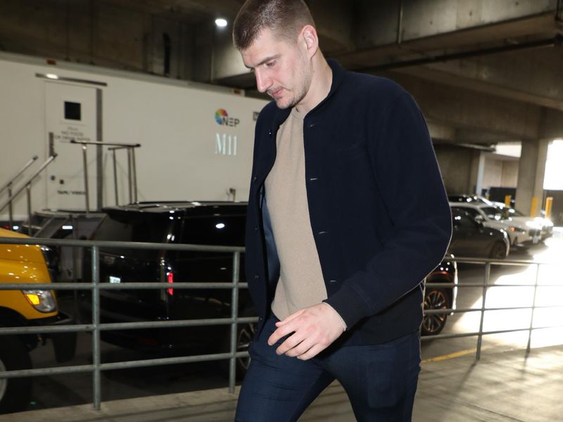 PORTLAND, OR - FEBRUARY 23: Nikola Jokic #15 of the Denver Nuggets arrives to the arena before the game against the Portland Trail Blazers on February 23, 2024 at the Moda Center Arena in Portland, Oregon. NOTE TO USER: User expressly acknowledges and agrees that, by downloading and or using this photograph, user is consenting to the terms and conditions of the Getty Images License Agreement. Mandatory Copyright Notice: Copyright 2024 NBAE (Photo by Cameron Browne/NBAE via Getty Images)