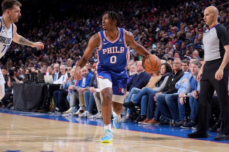 PHILADELPHIA, PA - MARCH 29: Tyrese Maxey #0 of the Philadelphia 76ers dribbles the ball during the game against the Dallas Mavericks on March 29, 2023 at the Wells Fargo Center in Philadelphia, Pennsylvania NOTE TO USER: User expressly acknowledges and agrees that, by downloading and/or using this Photograph, user is consenting to the terms and conditions of the Getty Images License Agreement. Mandatory Copyright Notice: Copyright 2023 NBAE (Photo by Jesse D. Garrabrant/NBAE via Getty Images)