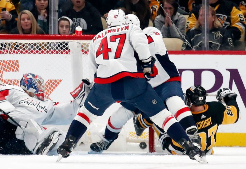 Jan 2, 2024; Pittsburgh, Pennsylvania, USA;  Pittsburgh Penguins center Sidney Crosby (87) scores a goal against the Washington Capitals during the second period at PPG Paints Arena. Mandatory Credit: Charles LeClaire-USA TODAY Sports