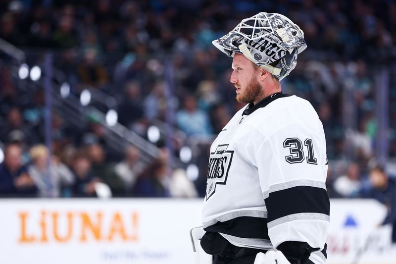 Dec 10, 2025; Seattle, Washington, USA; Los Angeles Kings goaltender Anton Forsberg (31) looks on in the first period against the Seattle Kraken at Climate Pledge Arena. Mandatory Credit: Kevin Ng-Imagn Images