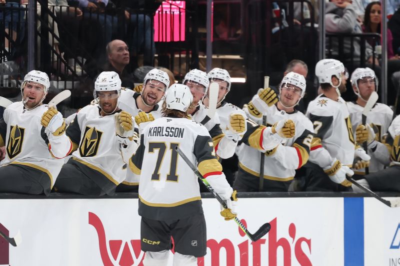 Nov 15, 2024; Salt Lake City, Utah, USA; Vegas Golden Knights center William Karlsson (71) reacts with the bench after scoring a goal against the Utah Hockey Club during the third period at Delta Center. Mandatory Credit: Rob Gray-Imagn Images