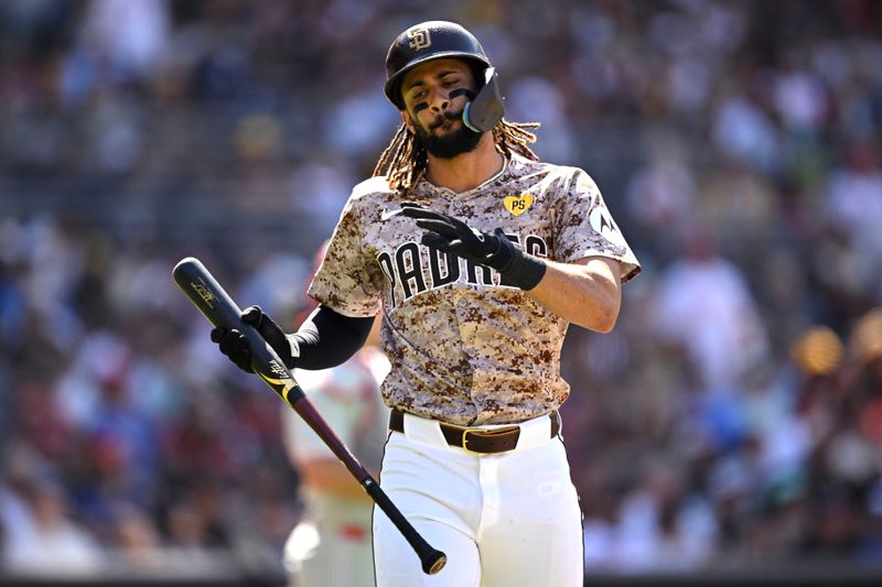 Apr 28, 2024; San Diego, California, USA; San Diego Padres right fielder Fernando Tatis Jr. (23) reacts after flying out during the seventh inning against the Philadelphia Phillies at Petco Park. Mandatory Credit: Orlando Ramirez-USA TODAY Sports