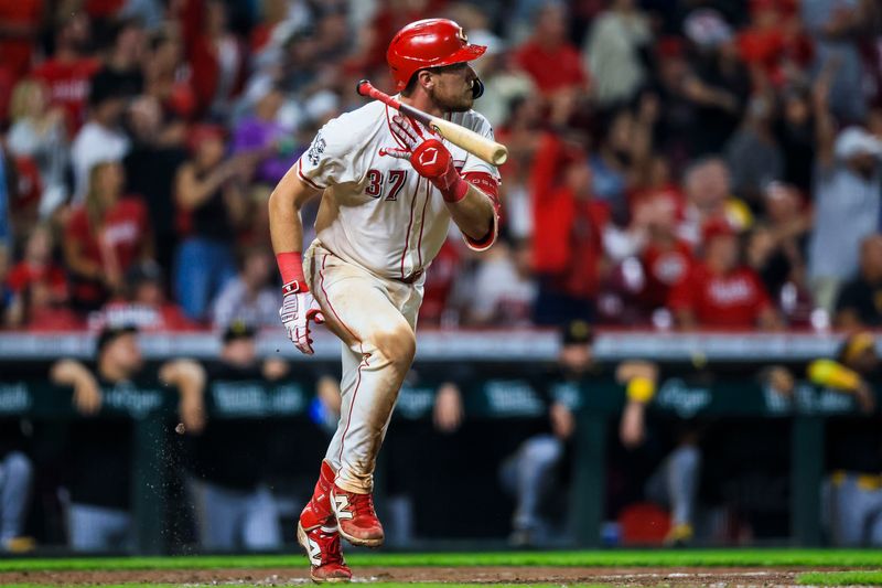 Sep 24, 2025; Cincinnati, Ohio, USA; Cincinnati Reds catcher Tyler Stephenson (37) flips his bat after hitting a solo home run in the ninth inning against the Pittsburgh Pirates at Great American Ball Park. Mandatory Credit: Katie Stratman-Imagn Images