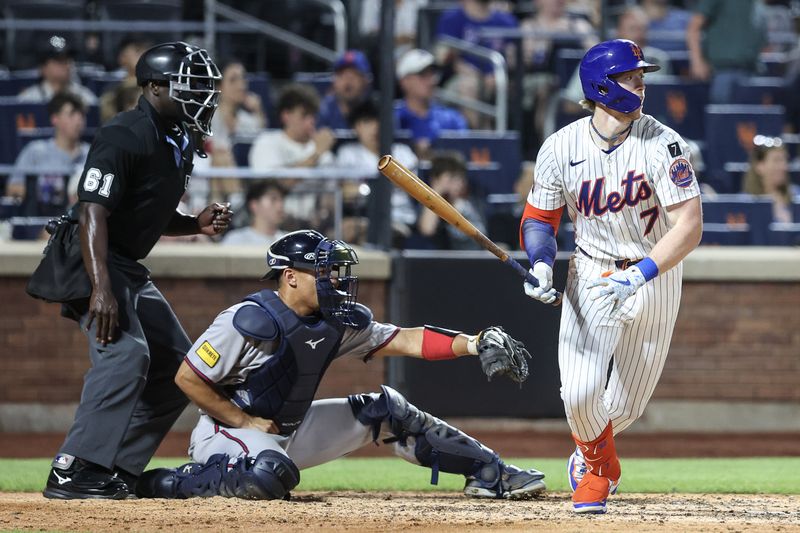 Jun 25, 2025; New York City, New York, USA;  New York Mets third baseman Brett Baty (7) hits a single in the fifth inning against the Atlanta Braves at Citi Field. Mandatory Credit: Wendell Cruz-Imagn Images